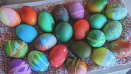 A tray of brightly colored Easter eggs
